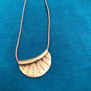 Sterling Silver Sun disk pendant on nylon cord